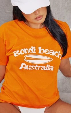 T-shirt Orange à Imprimé Bondi Beach -Logic || Zero Soldes Magasin 1545374a95626a64a1d82930c85e820ce6af84a9 cne1970 4