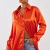 Chemise Satinée Orange Boutonnée Devant