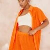Chemise Oversize Plissée Orange Vif à Manches Courtes Et Boutons -Logic || Zero Soldes Magasin 7053b20f0e0667172b92dc224dbfab1d909440f5 cne8707 1