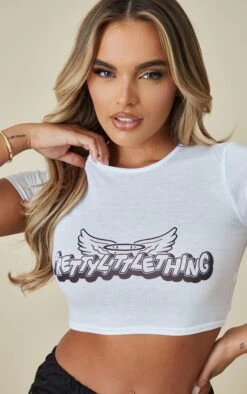 PRETTYLITTLETHING T-shirt Court Rose Tendre Imprimé Ailes -Logic || Zero Soldes Magasin b054774a01d50c8343f33628a486852073a1067d cnd6067 4